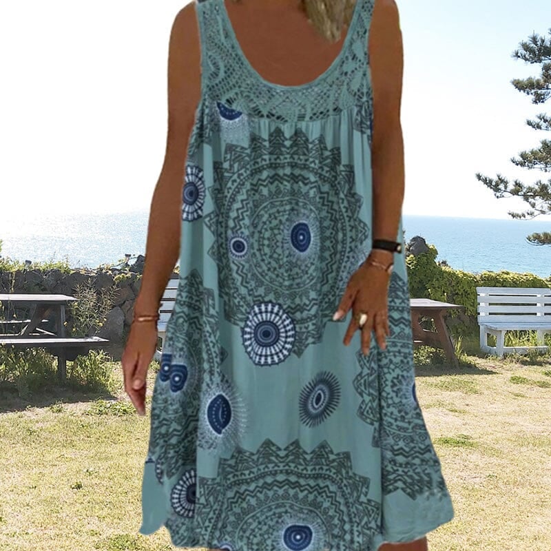 Close-up of the sleeveless summer dress showing fabric drape and neckline detail
