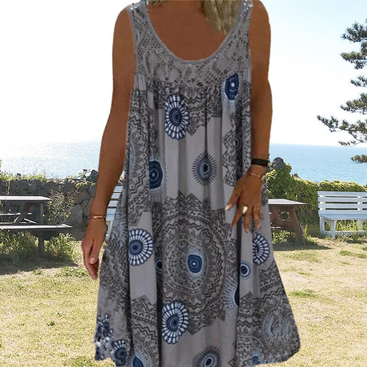 Sleeveless summer dress in blue displayed on a model, front view