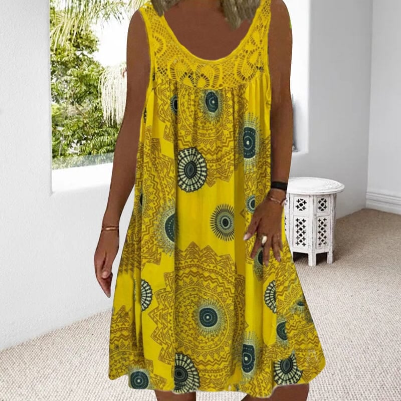 Sleeveless summer dress in yellow on a model, showing fit from waist to hem