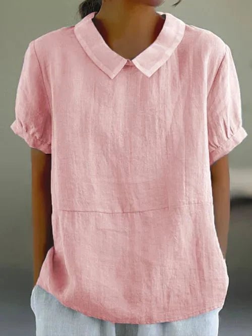 Close-up of the contrast white Peter Pan collar and cuffed short sleeve on the Ivy top