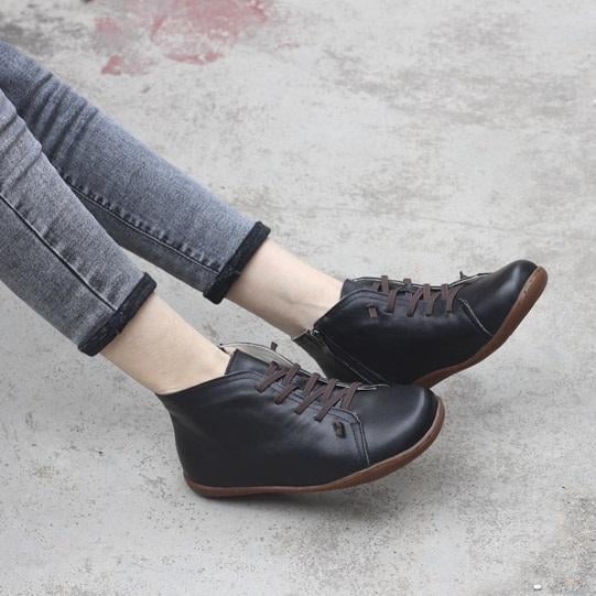 Side profile of Ivy zip boots in gray showing the leg-lengthening silhouette
