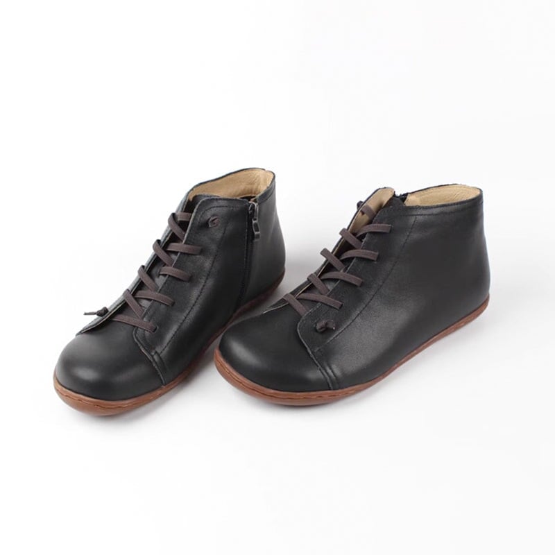 Ivy zip boots in brown on a neutral background