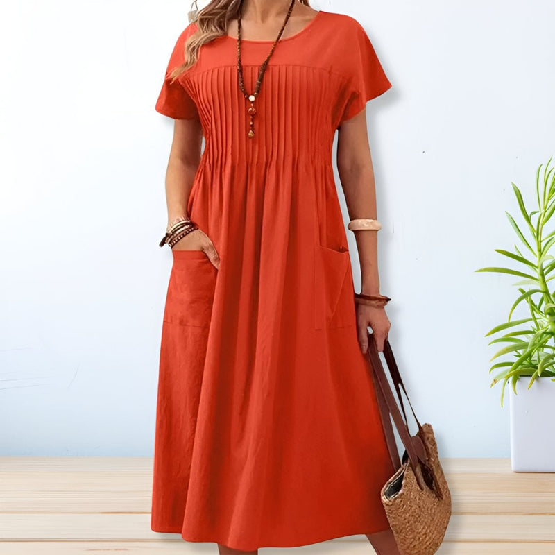 Close-up of the Jacqueline relaxed fit day dress showing the flowy fabric and side pocket detail