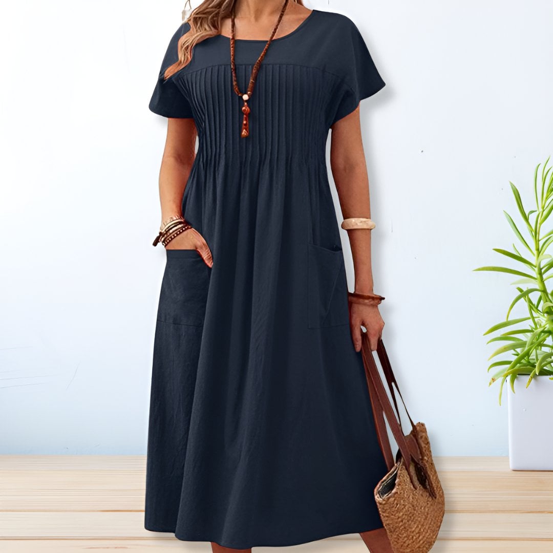 Size and fit guide chart for the Jacqueline relaxed fit day dress available in sizes S through 5XL