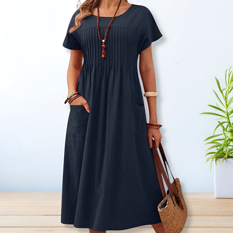Size and fit guide chart for the Jacqueline relaxed fit day dress available in sizes S through 5XL