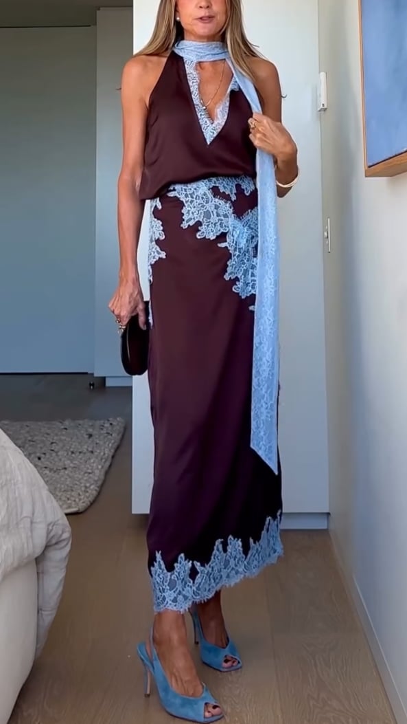 Model wearing an elegant brown and blue lace panel top and skirt set, front view