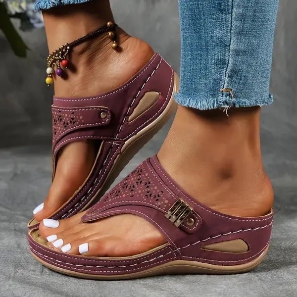 Jade orthopedic sandal in blue on a neutral background, showcasing lightweight breathable construction, three-quarter view
