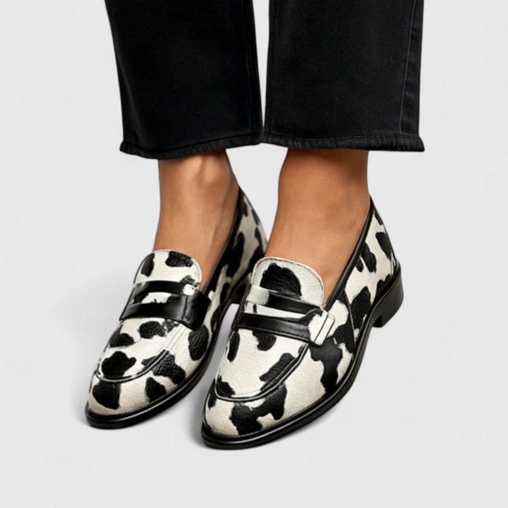 Black and white women's Jamie comfortable loafers with a classic polished silhouette, shown from a front angle