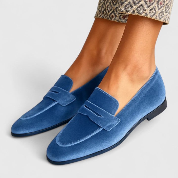 Blue Jane sophisticated loafers with a sleek silhouette and cushioned insole, shown from a front three-quarter angle
