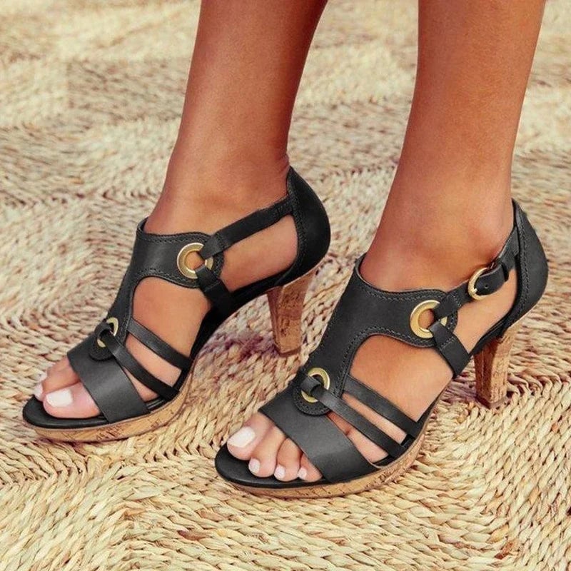 Women's grey block heel with cushioned footbed and classic silhouette on a clean background