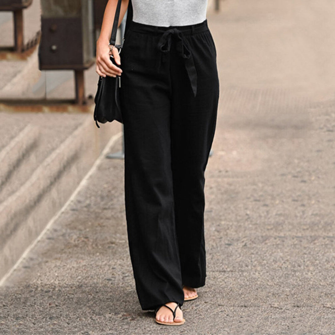 Side view of the Jane wide-leg pants showing the full-length straight leg silhouette