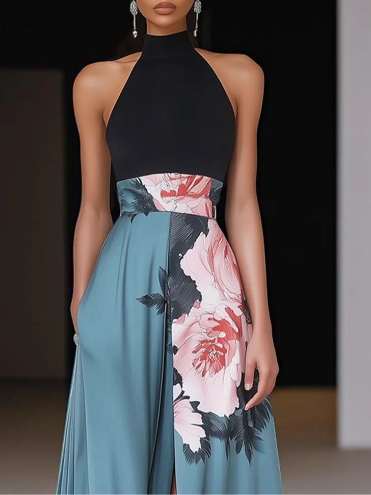 Close-up detail of the black floral print and side slit on a sleeveless maxi dress