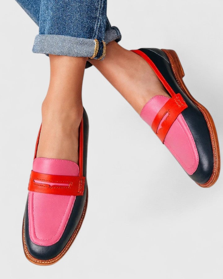 Janelle elegant pink loafers shown from a front three-quarter angle, highlighting the sleek streamlined silhouette