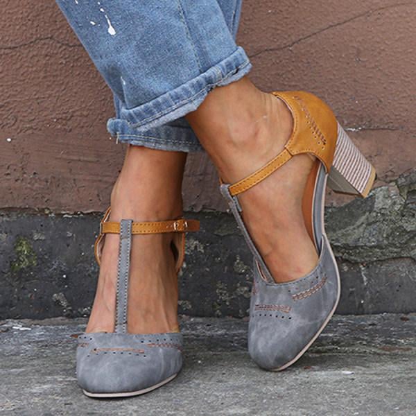 Janet orthopedic heels in blue showing arch-support insole detail, three-quarter view