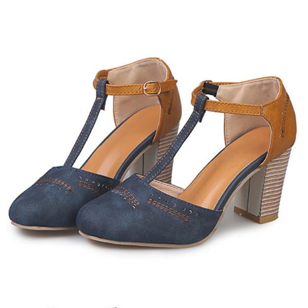 Woman wearing Janet comfort heels in black, walking with confidence, lifestyle photo