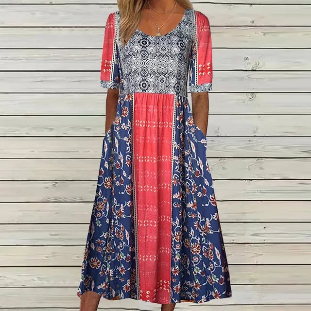 Side view of flowing bohemian print dress showing relaxed fit and movement