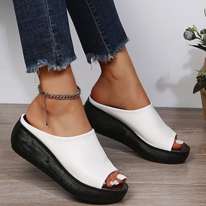Jasmine women's cushioned sandals in white shown from above highlighting the sleek slip-on silhouette