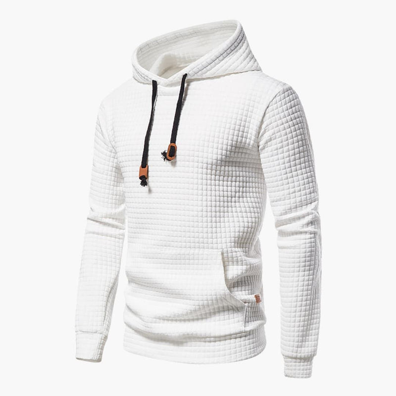 Woman wearing a white checkered comfort hoodie with a snug hood, styled casually