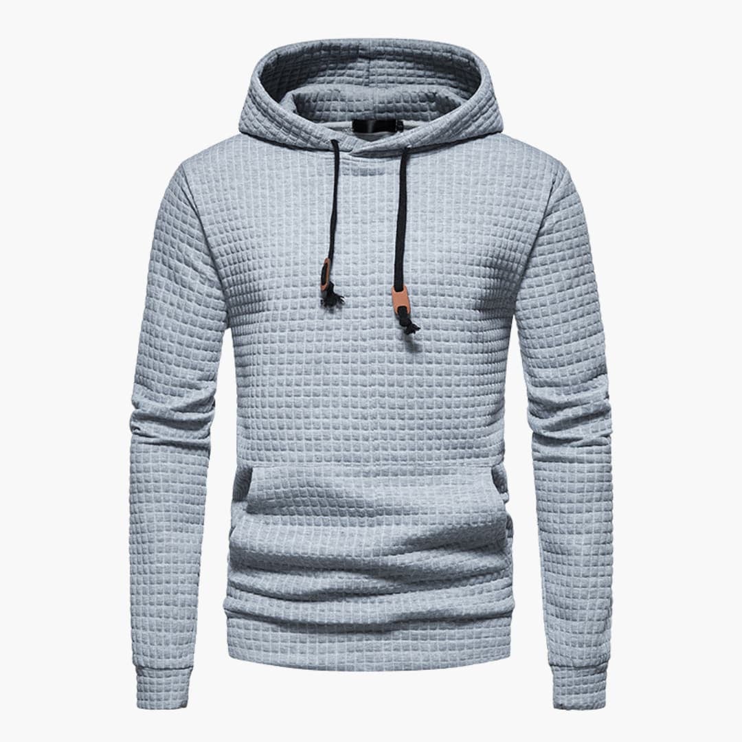 Flat lay of the Jasper Comfort Hoodie in black on a clean white background