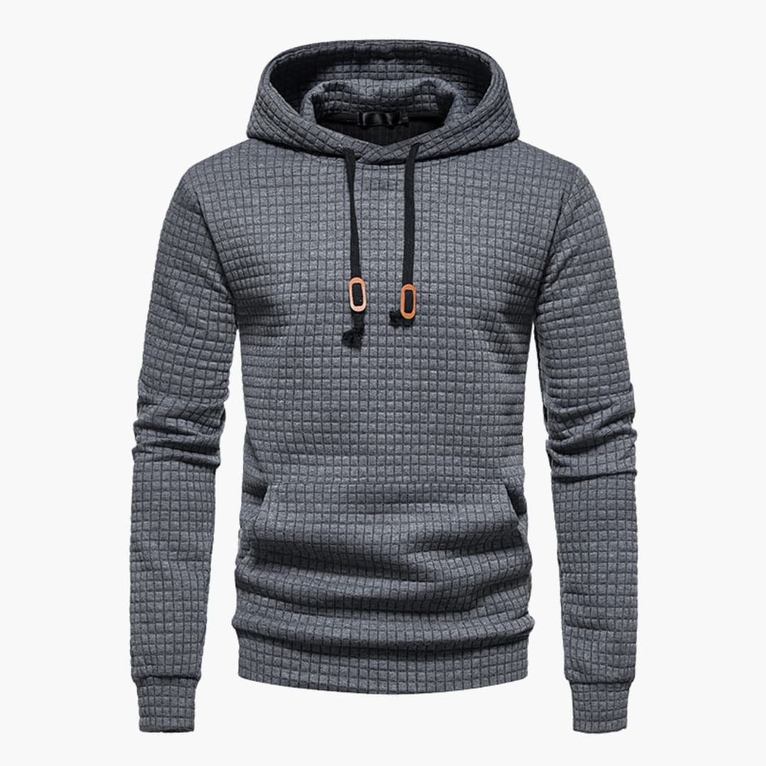 Close-up of sleeve cuff detail on the black Jasper Comfort Hoodie