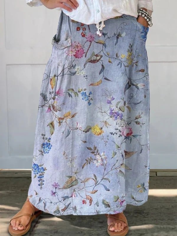 Florimay elegant vintage violet print A-line pocket skirt with elastic waistband, flowing silhouette shown on model