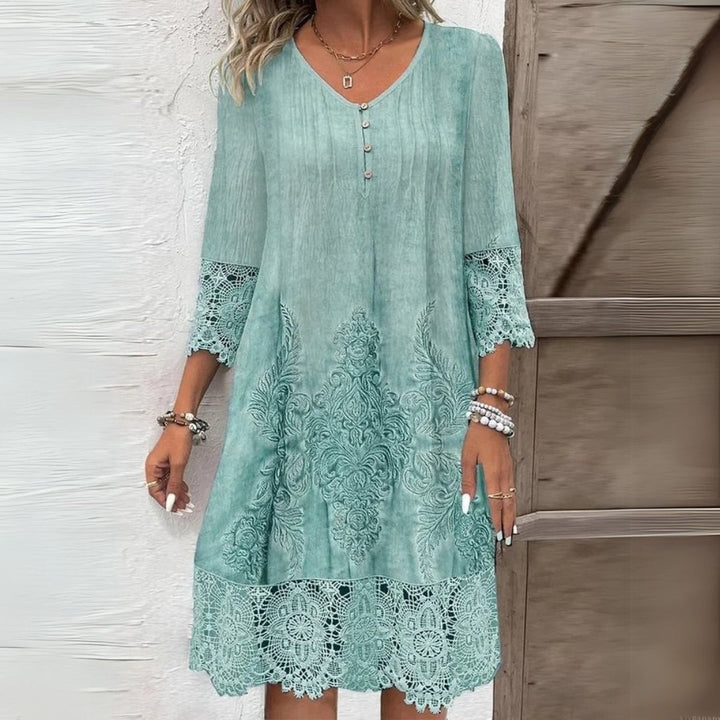 Close-up detail of delicate floral embroidery on a soft, breathable midi dress