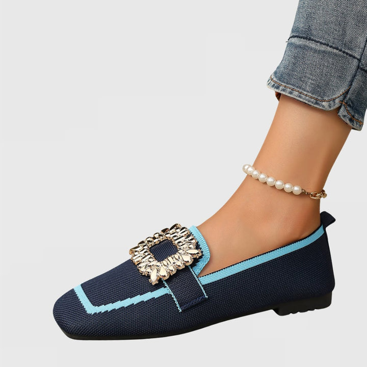 Jessie orthopedic loafers in orange, three-quarter angle showing overall silhouette
