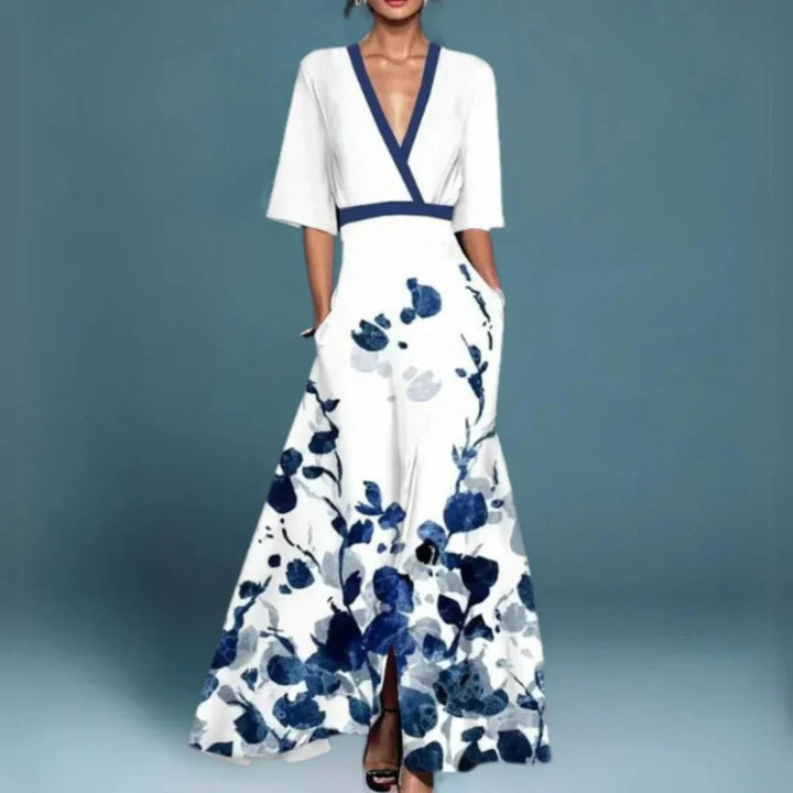 Close-up detail of a romantic floral print on a lightweight maxi dress available in blue and white