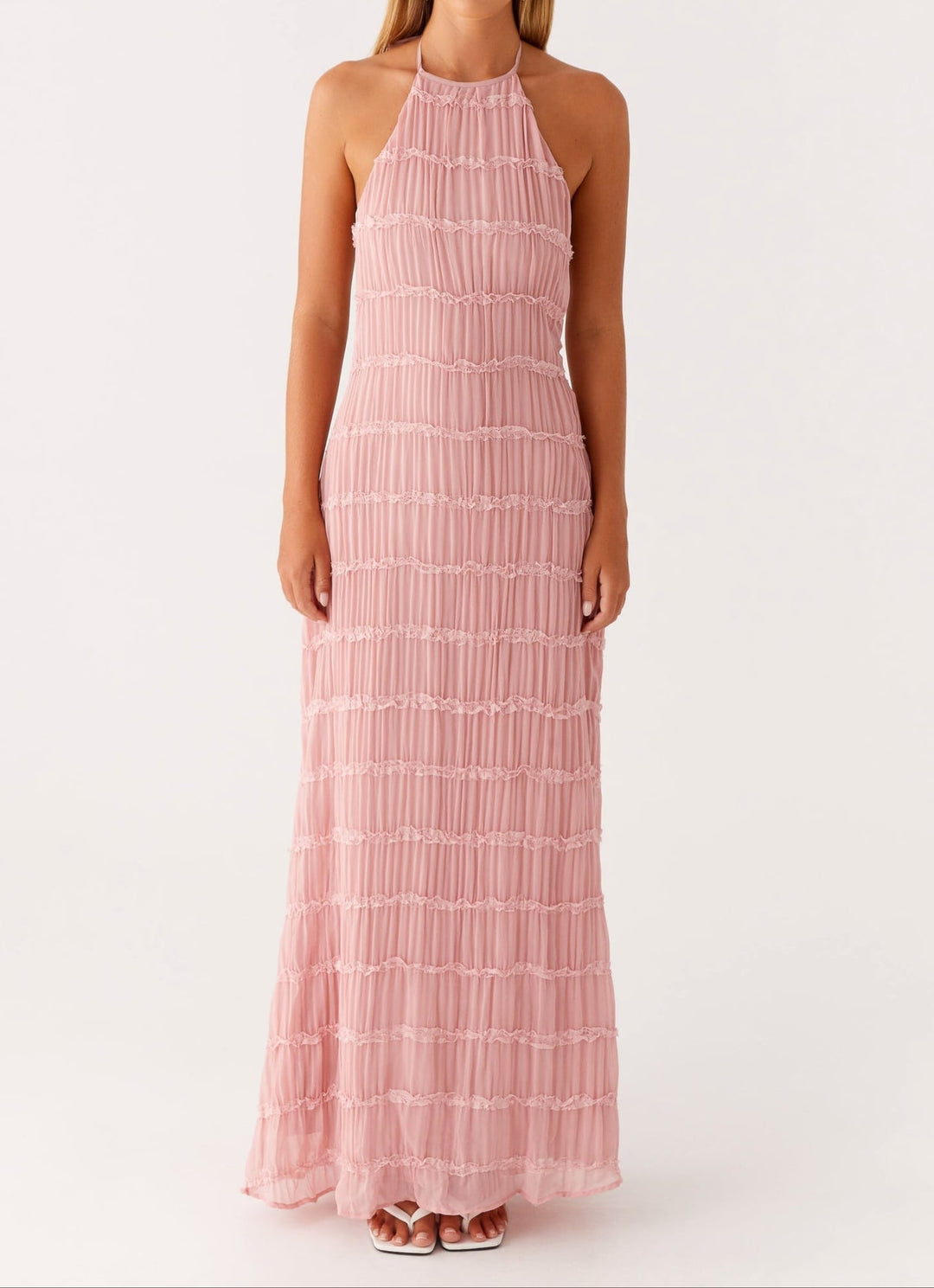 Blue halter maxi dress on model showing adjustable halter neckline and relaxed silhouette