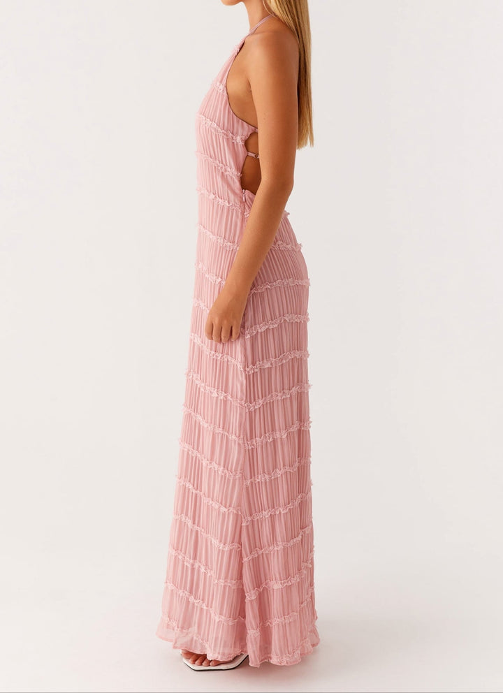Yellow halter maxi dress full-length shot showing vibrant color and flowing fabric