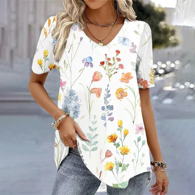 Woman wearing a relaxed-fit striped V-neck tee in a casual daytime setting
