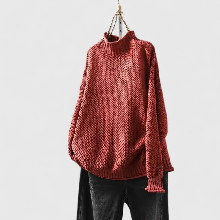 Front view of the Jordyn sophisticated sweater in red showing its clean lines and body-skimming silhouette