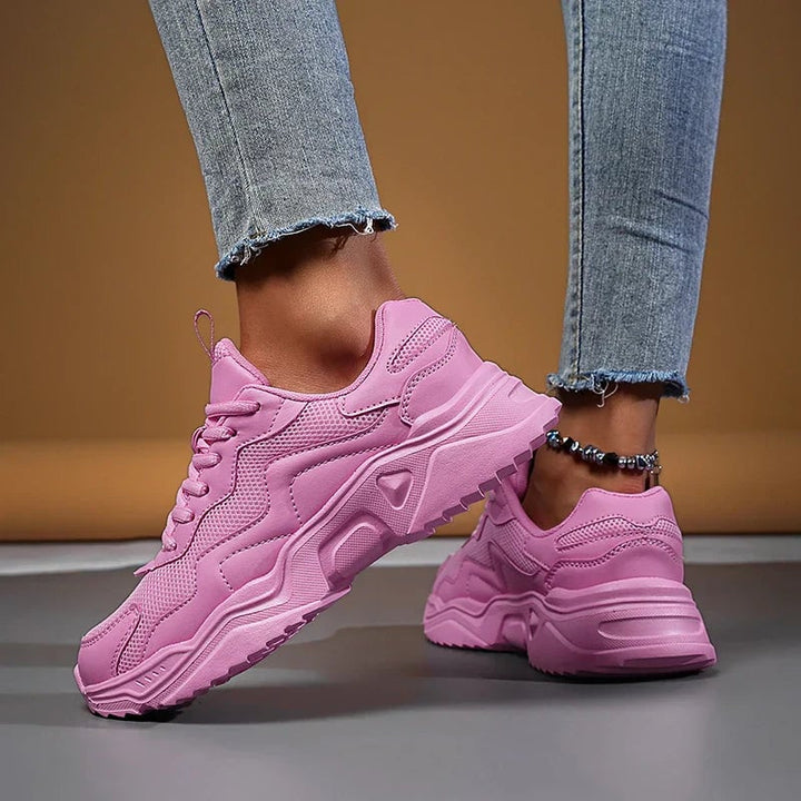 Josephine sneakers in pink showing flexible sole and mesh detail, top-down view