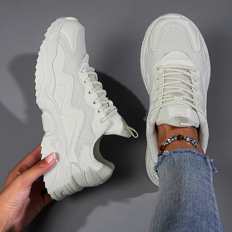 Close-up of Josephine sneaker mesh upper and lace detail in white colorway