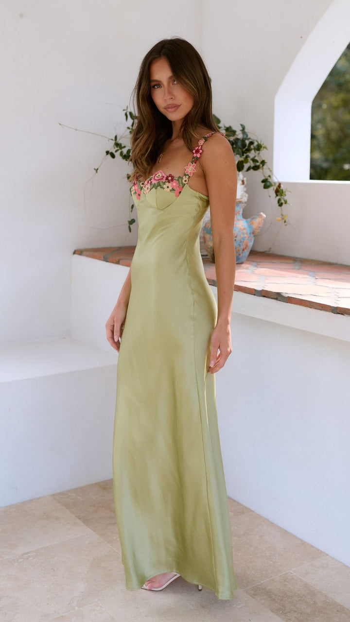 Back view of the Josephine apple green embellished dress highlighting the elegant drape