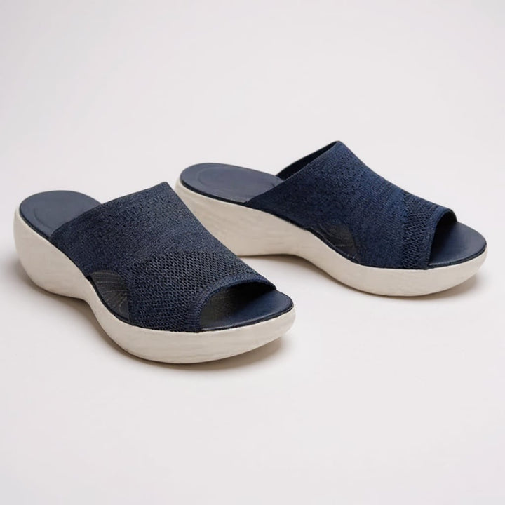 Jovie orthopedic sandal in pink displayed from a side angle highlighting cushioned sole