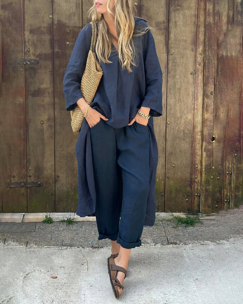 Woman wearing a coordinated two-piece set in navy blue with a relaxed, flattering fit