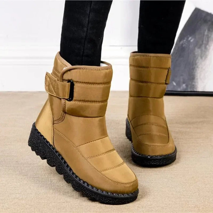 Women's waterproof boots sole detail showing supportive tread
