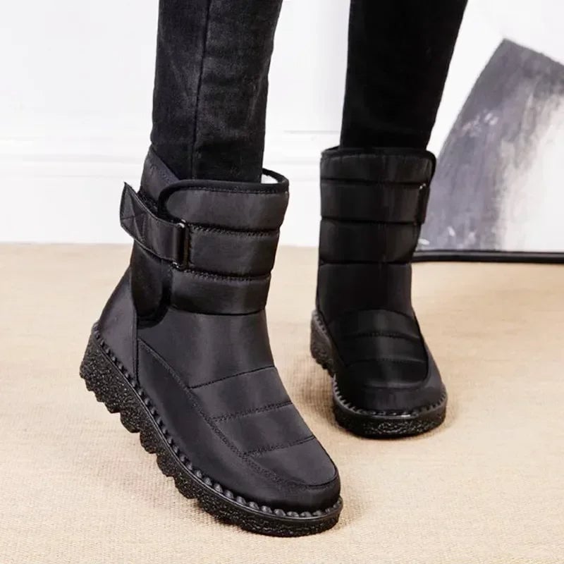 Women's waterproof boots in black shown from the back
