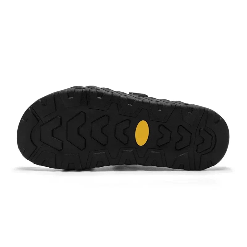 Joy women's slippers in black shown from above highlighting the slip-on opening