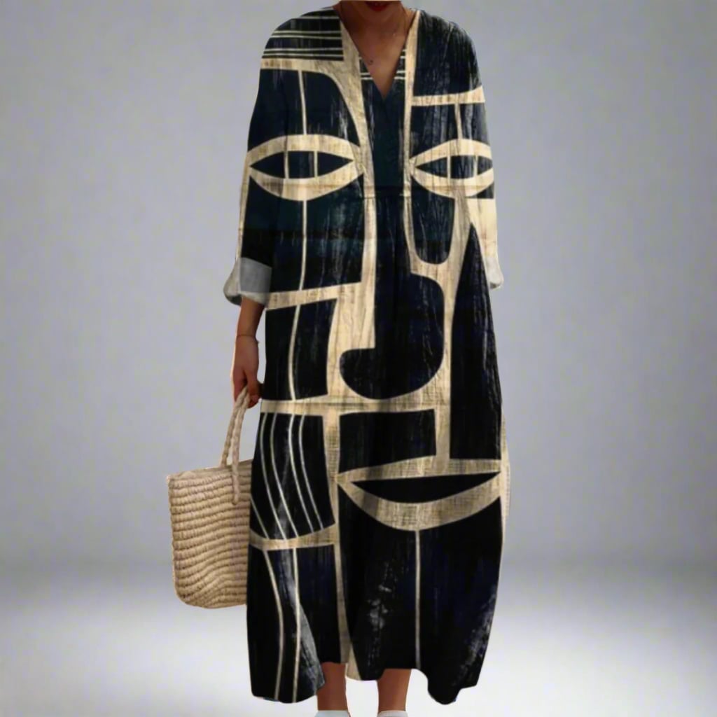 Model wearing the Julianna elegant geometric print dress in a flowing silhouette, available in sizes XS to 3XL