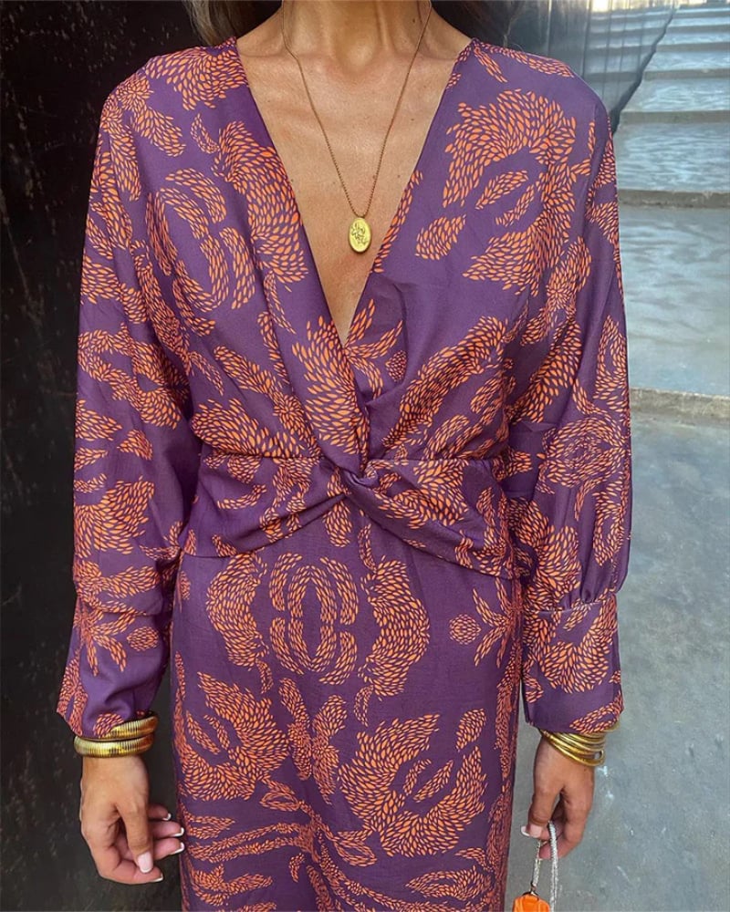 Front view of a green long sleeve maxi dress showcasing the figure-flattering cut