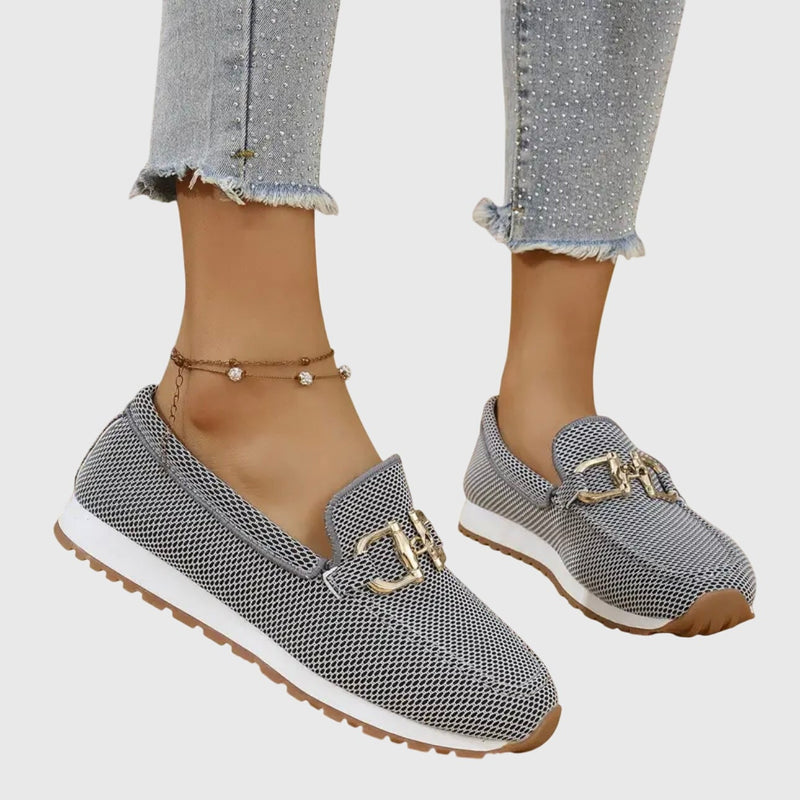 June orthopedic loafers in white styled with cropped trousers, front view