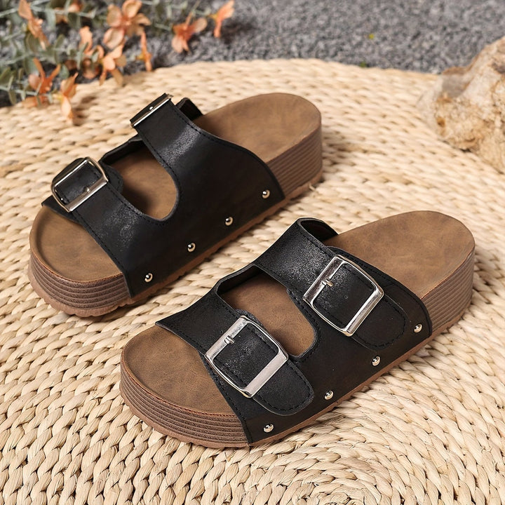 Close-up of Juniper sandal sole and heel support in coffee brown