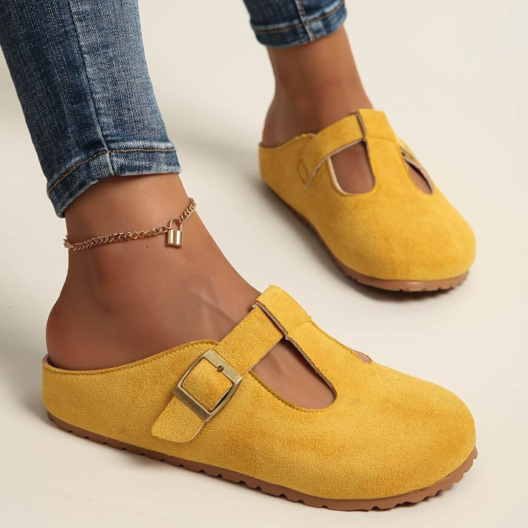 Florimay Juniper women's yellow buckle clogs, front view showing adjustable strap and flat sole