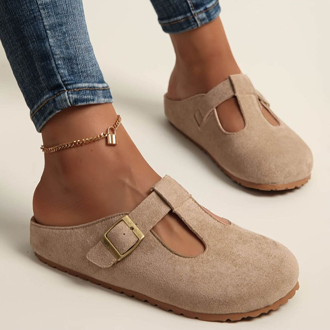Top-down view of Florimay Juniper yellow buckle clogs showing footbed and strap