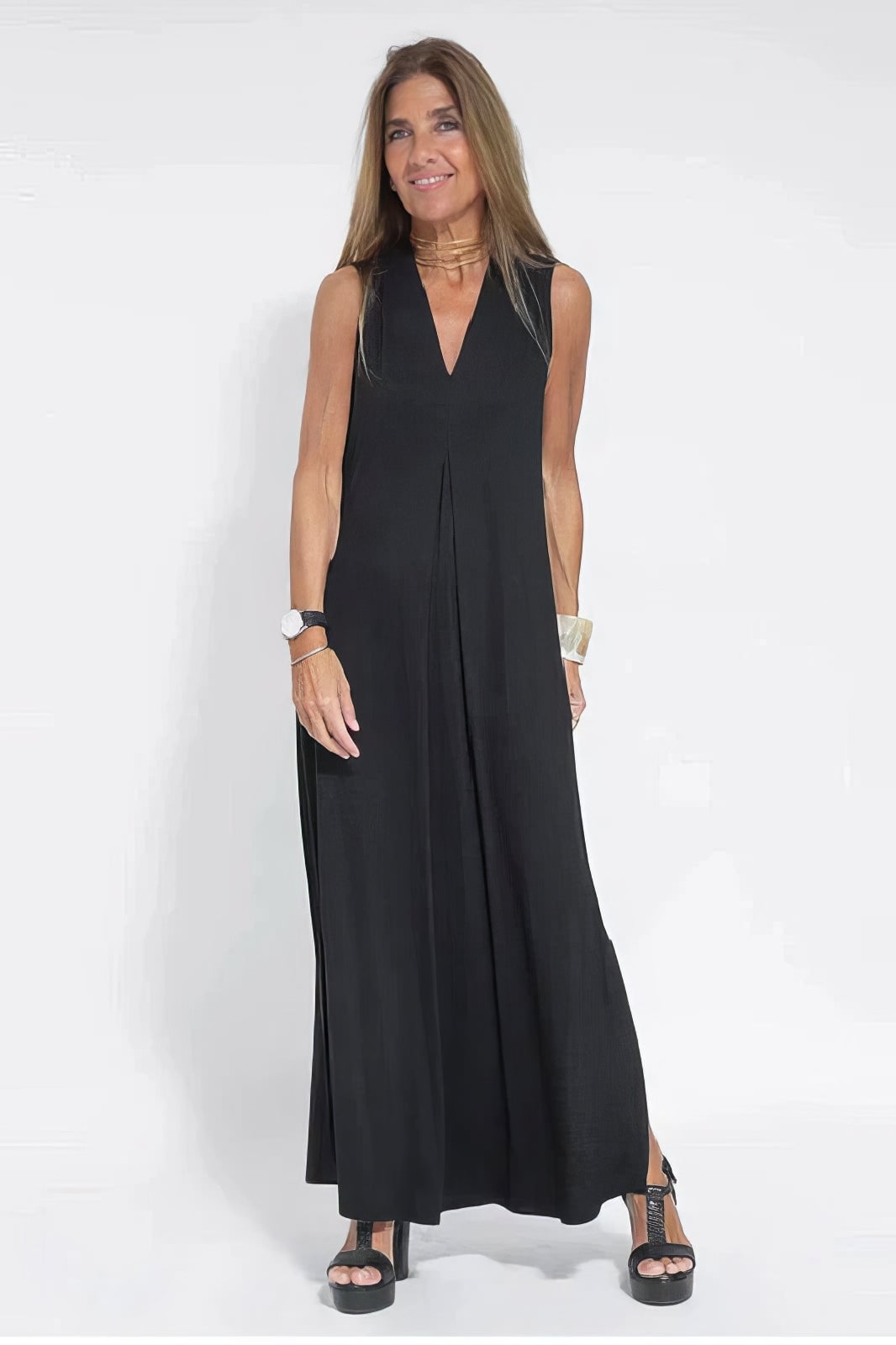 Front view of a black long dress with matching cardigan styled for a polished, put-together look