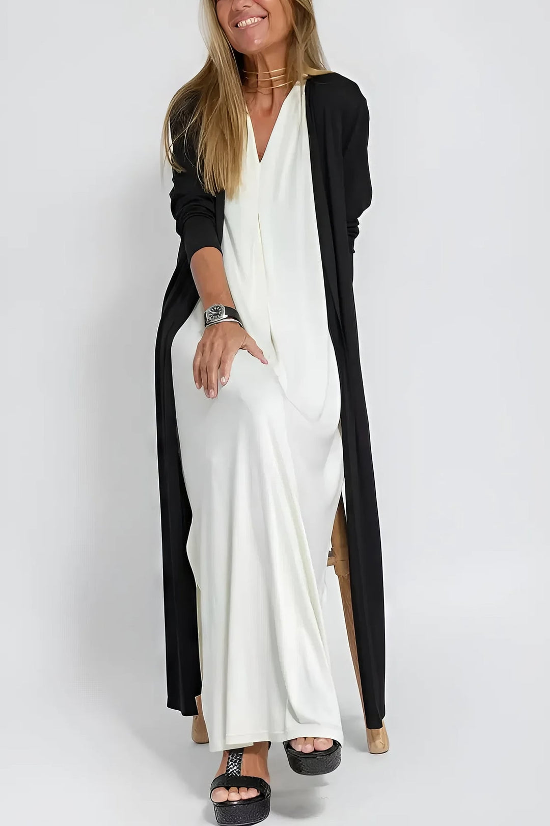 Model wearing a coffee long dress and cardigan set styled for a casual weekend outing