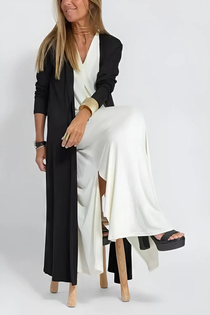 White coordinated dress and cardigan set on a model, perfect for office or dinner occasions