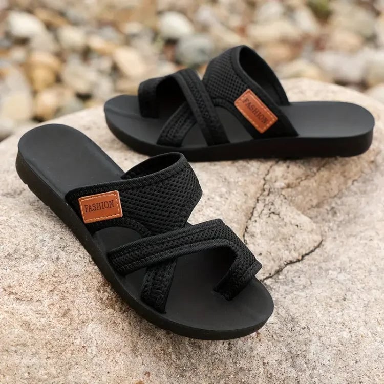 Pair of Juno sandals in black and brown side by side showing color options